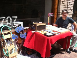 The June 14th Sidewalk Sale was more performance than commerce.  