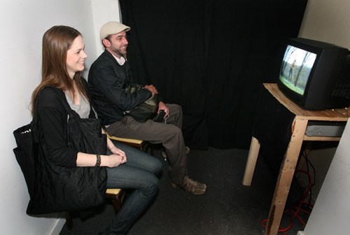 A back room in the installation featured video art "fishing fantasies."  L. Rippel