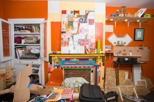 Central room of the project used as a work area, performance space and dining room.