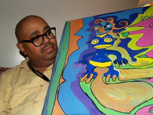 Steve Smith with one of his paintings.