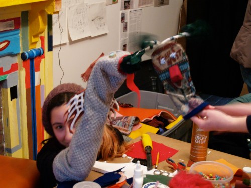 An impromptu performance by a visitor on puppet making day.  