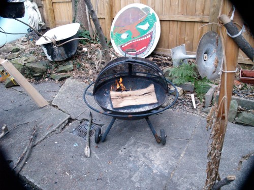 Backyard fire pit used for outdoor cooking.  