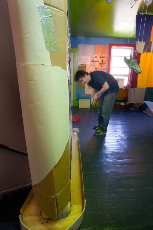During one month, I created a miniature golf course in the house.  This hole began on the second floor, with ramp wrapping down the stairs to the first floor.
