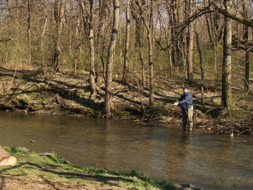 An angler on Yellow Breeches Creek, Central Pennsylvania.  The Fishing report covered trout fishing throughout the state.