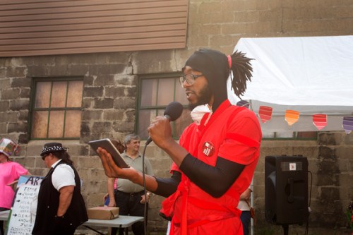 Team leader D.S. Kinsel delivers his artist statement.