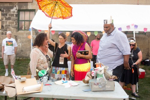 Judges Maritza Mosquera, Erika Johnson, Christiane D, and Wayne Younger debate the winner of the halftime show. 