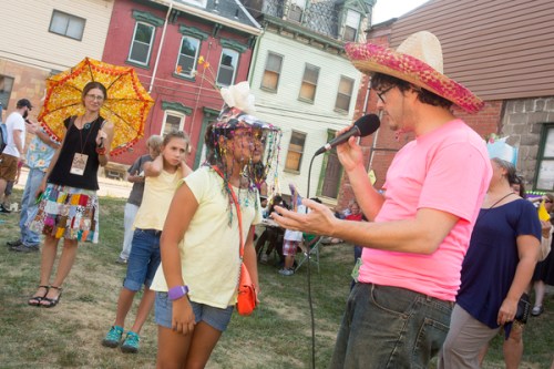 Mike Cuccaro interviews a young audience member. 