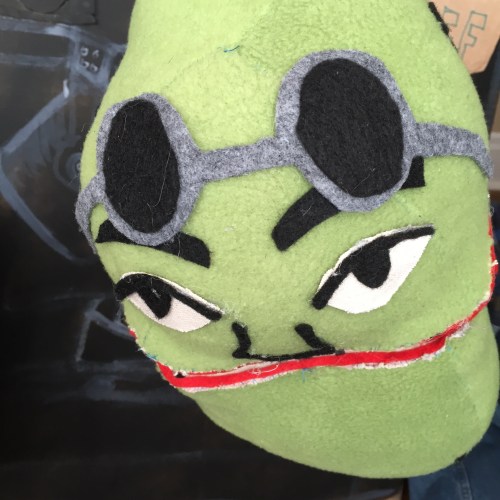 Hand puppet of steelworker Mike Kessel, operated by Mike Cuccaro.